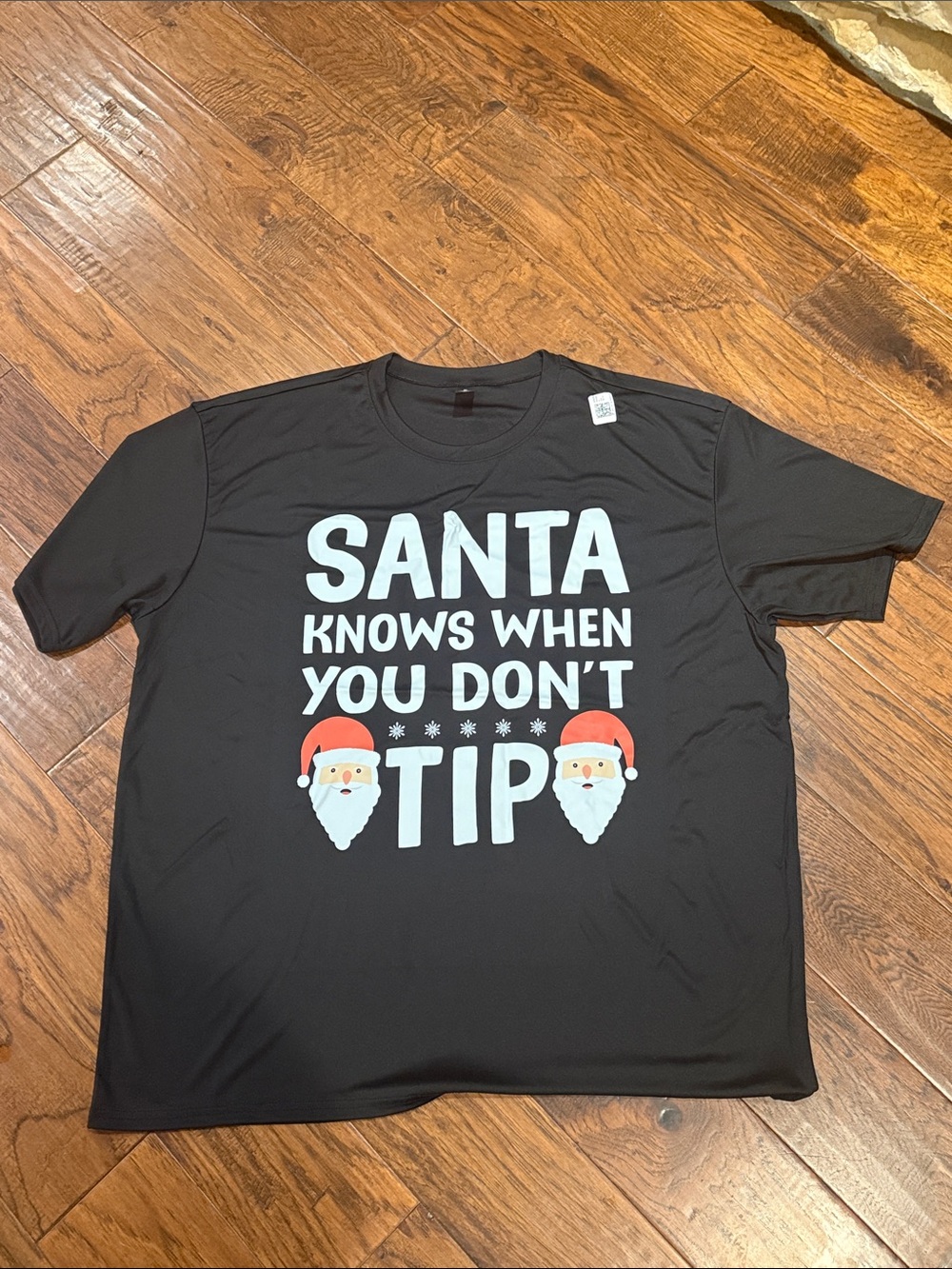 Source Unknown Black Tee with White Text and Red Santa Caps